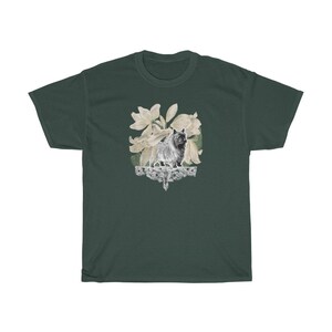 May include: A dark green t-shirt with a white graphic of a Cairn Terrier standing in front of a floral design.