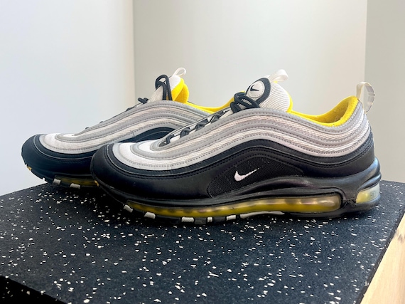 black and yellow air max 97