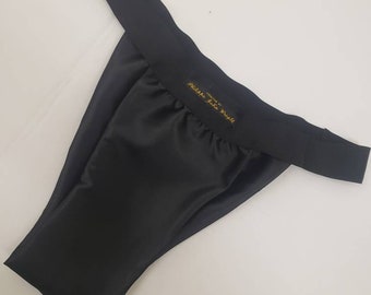 Men shiny satin briefs tanga like underwear fully lined with silky finish.