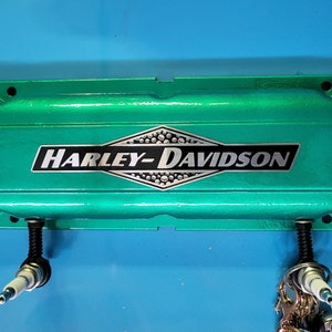 Repurposed Harley Davidson valve cover Spark Plug rack man cave