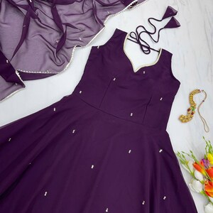 Faux Georgette And Full Sleeve With Work Purple Kurti