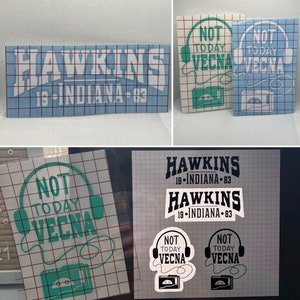May include: A set of four vinyl decals featuring the text "Hawkins 19-Indiana-83" and "Not Today Vecna" with a cassette tape and headphones graphic. The decals are on a white gridded background.