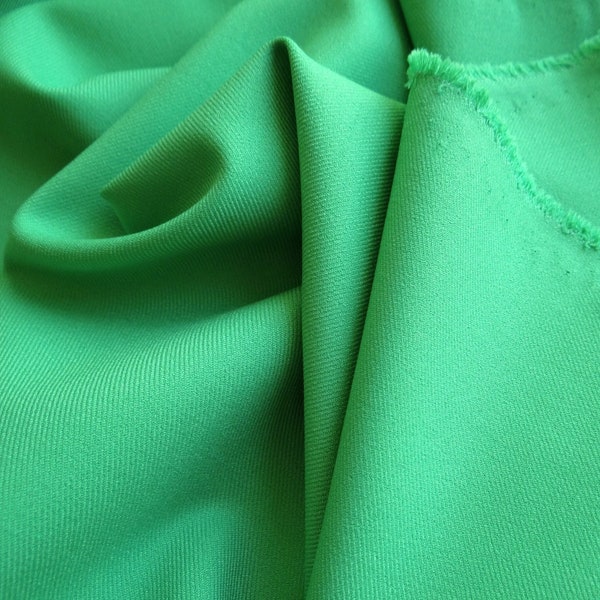 Italian stretch fabric with viscose in green, elastic viscose blend for dresses, tops, skirts, pants, blazers and costumes