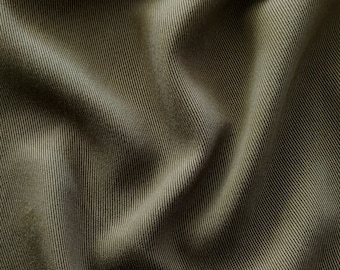 Soft gabardine viscose fabric in olive green, Italian fabric in a "used look" for softly falling trousers, skirts, dresses, blazers and jackets