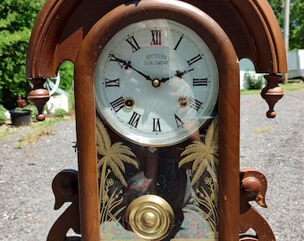 Wind up 31-day chime clock, with key. Southern clock company.