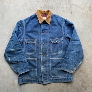 May include: A vintage blue denim jacket with a corduroy collar. The jacket has a button-up front, two chest pockets, and two large front pockets. The jacket has a worn look with faded areas and visible stitching.