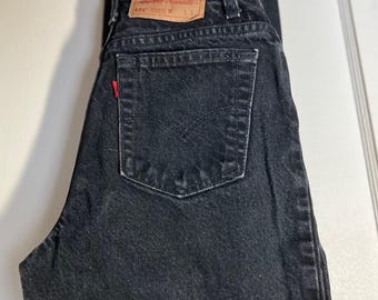 Vintage Levi’s 521 Jeans. Black. 100% cotton, made in USA 1994. Size 4 short