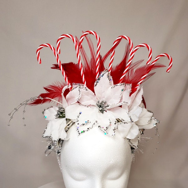 White Poinsettias and candy cane Christmas halo with red feathers