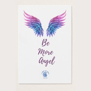 May include: A white background with a pair of purple and blue angel wings. The text "Be More Angel" is written in purple below the wings. The text "Lost at Sea" is written in blue below the text "Be More Angel".