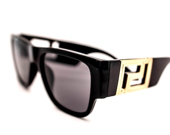 Gafas de sol cuadradas polarizadas negras: detalles dorados, protección UV400
