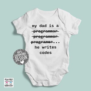 May include: White baby onesie with black text that reads "my dad is a programmer... he writes codes".