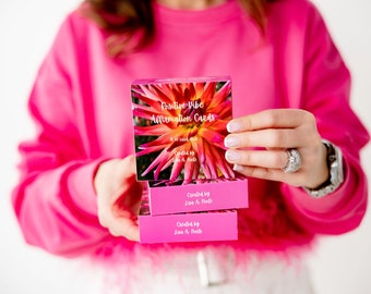Może przedstawiać: Stos różowych kart afirmacji z kwiatowym wzorem i tekstem "Positive Vibe Affirmation Cards" i "Created by Lisa A. Forte".