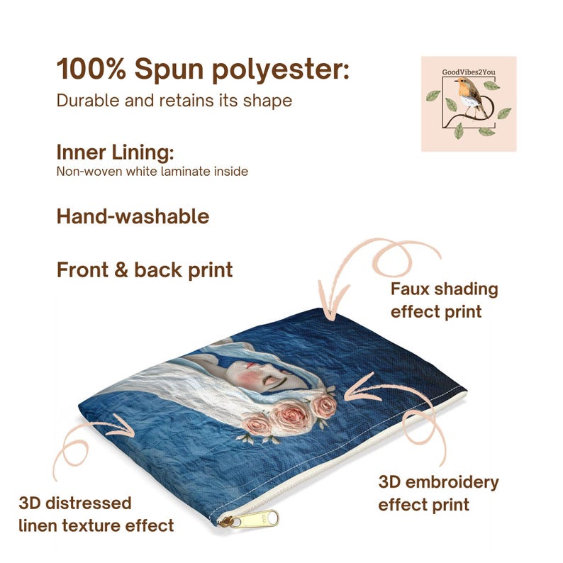 May include: A blue cosmetic bag with a woman's portrait and floral accents. The bag is made of 100% spun polyester and features a 3D distressed linen texture effect. The bag has a gold zipper and is hand-washable.