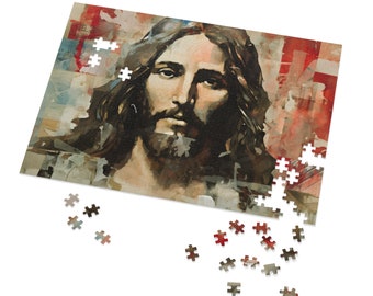 Op de afbeelding: Een legpuzzel met een portret van Jezus met lang bruin haar en een baard. Het kunstwerk heeft een schilderachtige stijl met rode, witte en blauwe abstracte achtergrondelementen. Sommige puzzelstukjes zijn los.