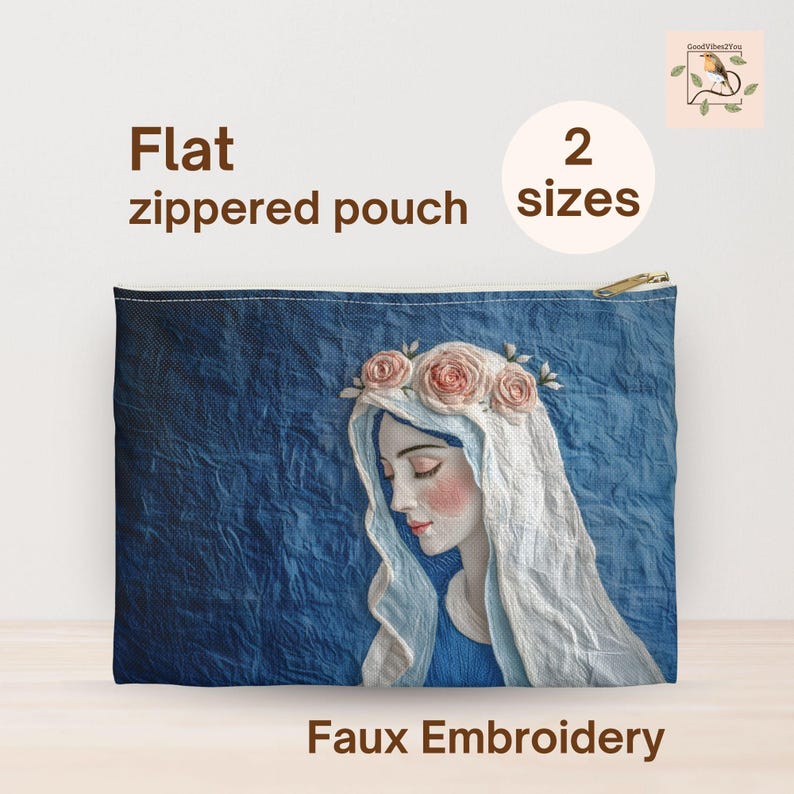 May include: Flat zippered pouch with a faux embroidery design. The pouch features an illustration of a woman with a floral crown and white veil against a blue background. The text "2 sizes" is displayed.