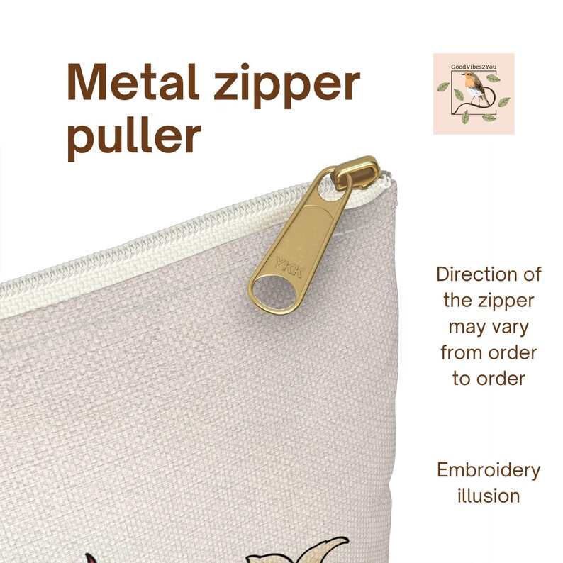 May include: Close-up of a beige pouch with a gold metal zipper puller. The text "Metal zipper puller" is visible. Additional text indicates the zipper direction may vary and mentions an embroidery illusion.