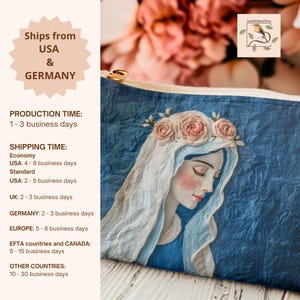 May include: A blue zippered pouch featuring an illustration of a woman with a floral crown and a white veil. The artwork has a soft, painterly style with pink and blue tones. The pouch is likely for cosmetics or small items.
