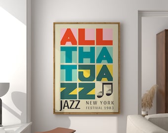 May include: A framed poster with the text "ALL THAT JAZZ NEW YORK FESTIVAL 1983" in a colorful block font. The poster is hanging on a white wall in a living room setting.