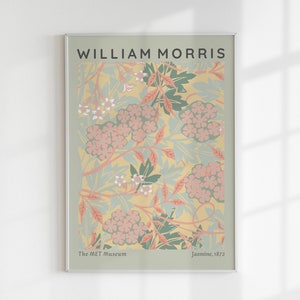 May include: A poster featuring a floral pattern in shades of pink, green, and yellow. The poster is titled "William Morris" and includes the text "The Met Museum" and "Jasmine, 1872".