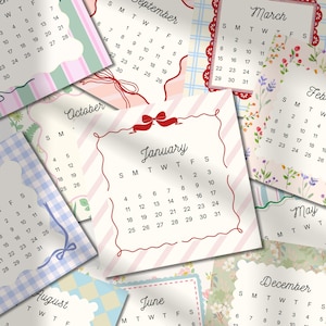 May include: A collection of decorative calendars with various months displayed. Each calendar features a unique design, including floral patterns, stripes, and bows. The January calendar is prominently featured, with a red bow and frame.