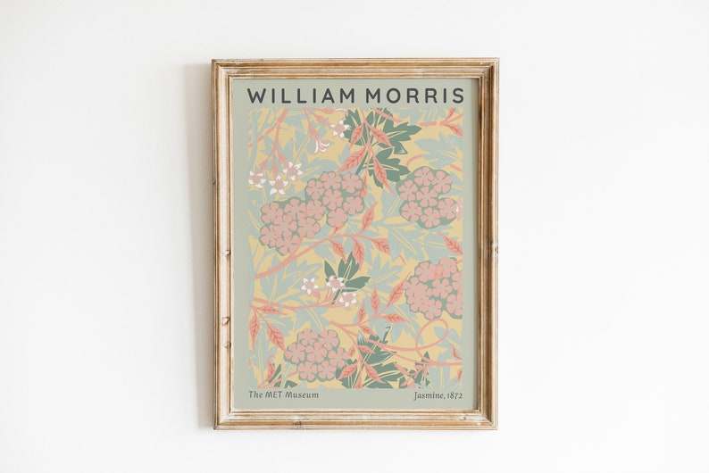 May include: A framed print of a floral pattern by William Morris, titled "Jasmine, 1872". The print features a yellow background with pink and green flowers and leaves. The print is from The Met Museum.