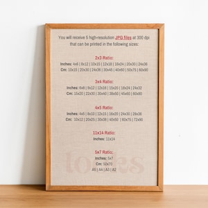 May include: A framed poster with a beige background and brown wood frame. The poster lists different print sizes in inches and centimeters for 5 aspect ratios: 2x3, 3x4, 4x5, 11x14, and 5x7. The text also includes the corresponding paper sizes for the 5x7 ratio: A5, A4, A3, and A2.