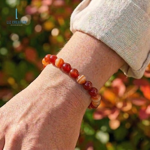 May include: A set of three ceramic mugs with a speckled, matte finish. The mugs are in shades of cream, light gray, and dark gray. Each mug has a simple, minimalist design, perfect for coffee or tea.