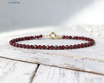 Pulsera minimalista de cristal de granate: delicada pulsera de piedra preciosa roja natural, piedra natal de enero, chakra raíz.