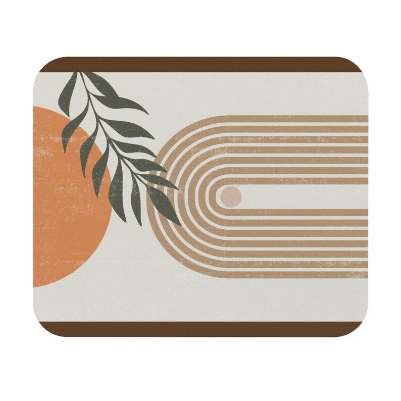 May include: Abstract art print with a brown frame, featuring a stylized orange sun, a green leaf branch, and a series of brown arches.