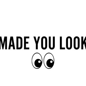Puede incluir: Texto en blanco y negro que dice "MADE YOU LOOK" con dos ojos de dibujos animados debajo del texto.