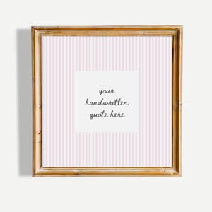 May include: A square wooden frame with a light brown finish containing a white insert with vertical light pink stripes. In the center, a white square features the dark gray handwritten text: your handwritten quote here.