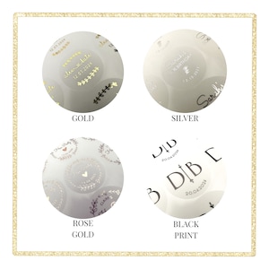 May include: Four round stickers with different finishes and designs. The stickers are gold, silver, rose gold, and black print. The gold sticker has the text "alex & kate 12.07.2024" in gold lettering. The silver sticker has the text "Sarah's 18th Birthday 12.10.2023" in silver lettering. The rose gold sticker has the text "The Party 15.06.2023" in rose gold lettering. The black print sticker has the text "DID 20.04.2024" in black lettering.