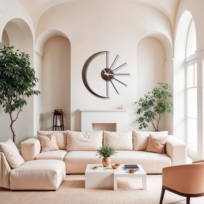 Modern moon wall clock combining wood crescent and black metal rays in minimalist interior decor