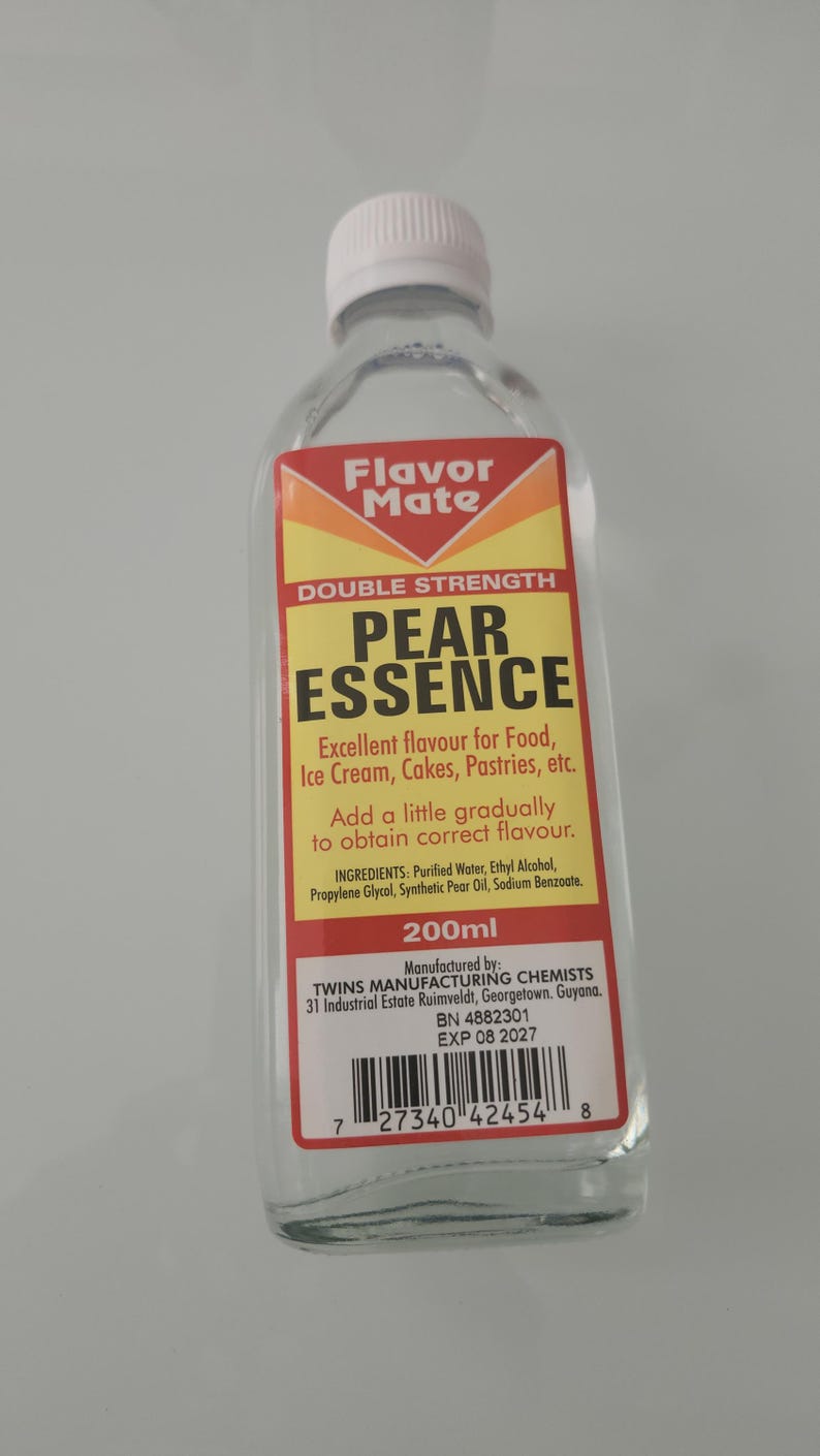 May include: A clear glass bottle of Pear Essence with a white cap. The label reads "Flavor Mate" and "Double Strength Pear Essence." It is for food, ice cream, cakes, and pastries. The bottle contains 200ml.