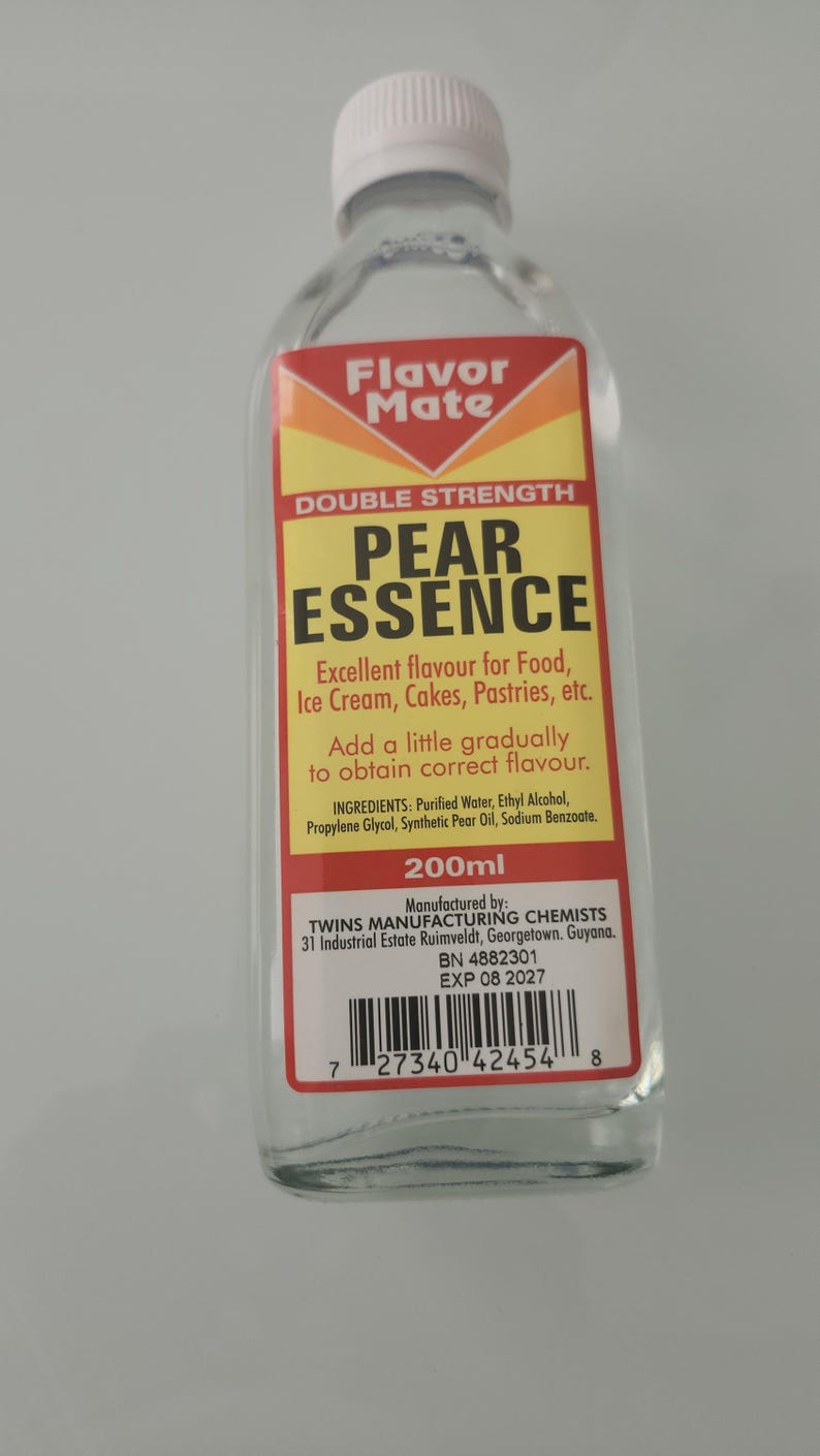 May include: A clear glass bottle of Pear Essence with a white cap. The label is yellow and red, with the text "Flavor Mate" and "Double Strength Pear Essence". The bottle contains 200ml of liquid.