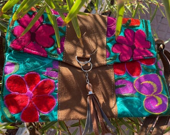 Floral embroidered suede bag