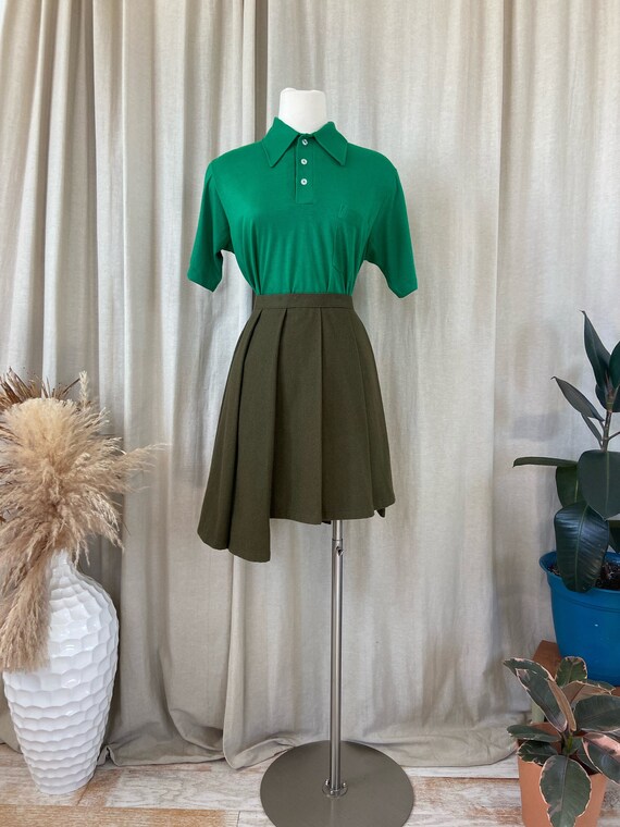 Hunter green pleated mini skirt