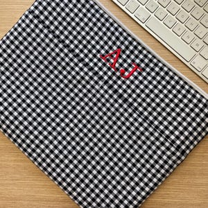 Custom-made, padded tablet case. Custom checked laptop sleeve. Gifts for events. custom accessories