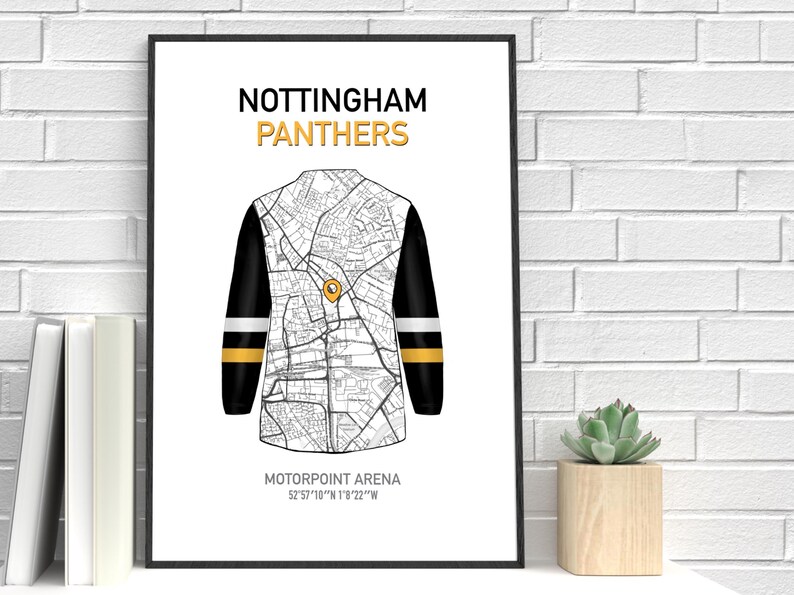 May include: A framed print featuring a stylized map design of a hockey jersey. The jersey design incorporates a map of Nottingham, with the text "NOTTINGHAM PANTHERS" in gold. The location of Motorpoint Arena is also indicated.