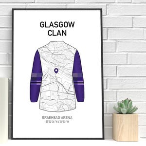 May include: A framed print featuring a stylized illustration of a Glasgow Clan jersey. The jersey design incorporates a map pattern and purple sleeves. The text "GLASGOW CLAN" is at the top, with "BRAEHEAD ARENA" and coordinates below.