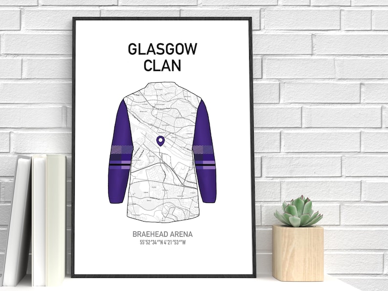 May include: A framed print featuring a stylized illustration of a Glasgow Clan jersey. The jersey design incorporates a map pattern and purple sleeves. The text "GLASGOW CLAN" is at the top, with "BRAEHEAD ARENA" and coordinates below.