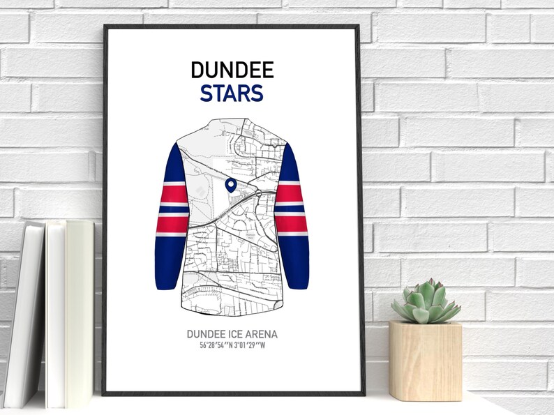 May include: A framed print featuring a stylized hockey jersey design. The jersey is white with blue sleeves and red stripes. The jersey design incorporates a map of the city. The text "DUNDEE STARS" is at the top.