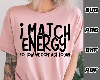 May include: A pink t-shirt with black text that reads "I match energy so how we gon' act today".