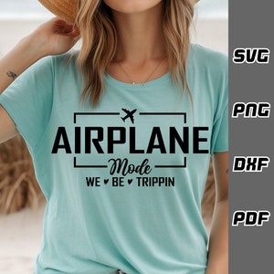 May include: A light blue t-shirt with a black graphic that says "Airplane Mode We ♥ Be ♥ Trippin".