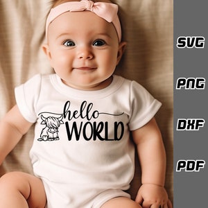 May include: A white baby onesie with a black Highland cow illustration and the text "hello world" in a cursive font.