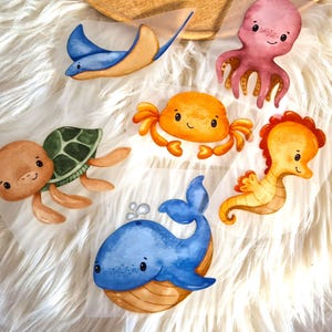 Toppa termoadesiva con creature marine applicata su abbigliamento per bambini riciclo creativo fai da te maglietta pantaloni borsa regalo personalizzato nascita battesimo