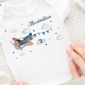 Iron-on image with desired name and age personalized airplane helicopter clouds sky