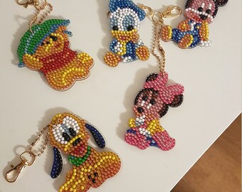 Tagaremuser 9 Pieces Rhinestone Keyrings DIY Diamond Keychain Cartoon Animals Diamond Painting Pendant for Art Craft Key Ring Phone Charm Bag Decor Dinosaur and Halloween Tagaremuser 9 Pieces Rhinestone Keyrings DIY Diamond Keychain Cartoon Animals Diamond Painting Pendant for Art Craft Key Ring Phone Charm Bag Decor Dinosaur and Halloween