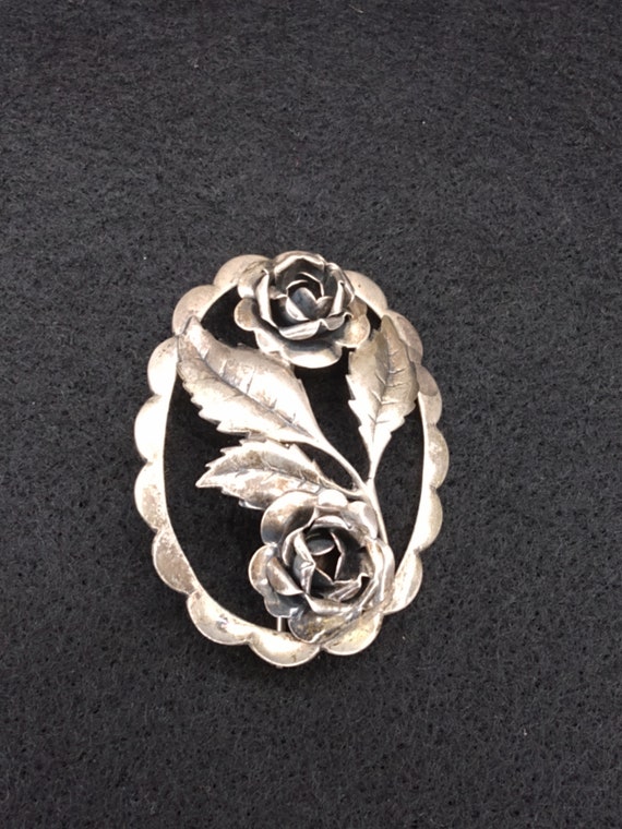 Vintage Dorothy Bauer sterling silver rose brooch