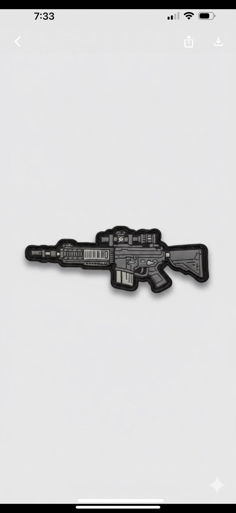 May include: A detailed patch featuring a stylized rifle with a scope and various attachments. The patch is primarily gray and black, with a textured appearance. The design is a tactical or military-themed item.